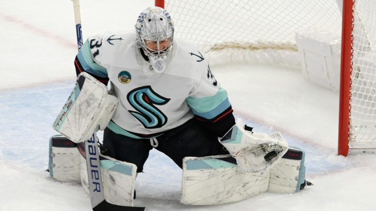 Seattle Kraken goalie Philipp Grubauer makes a save during the second period of an NHL hockey game against the Chicago Blackhawks, Tuesday, Nov. 28, 2023, in Chicago. (Paul Beaty/AP)