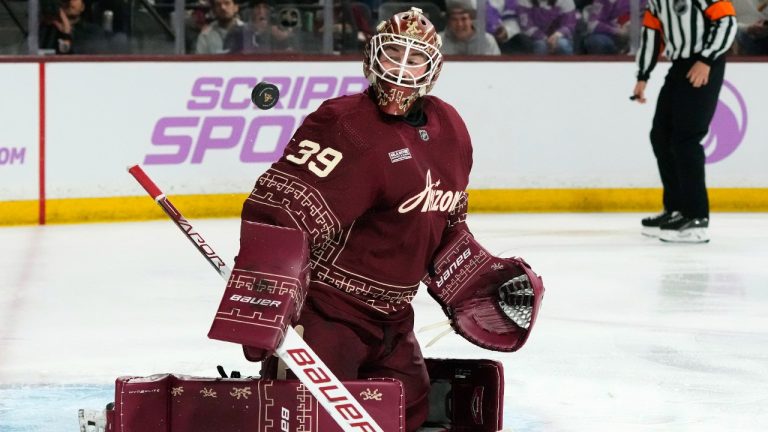 Arizona Coyotes goaltender Connor Ingram makes a save against the Colorado Avalanche during the second period of an NHL hockey game Thursday, Nov. 30, 2023, in Tempe, Ariz. (Ross D. Franklin/AP)