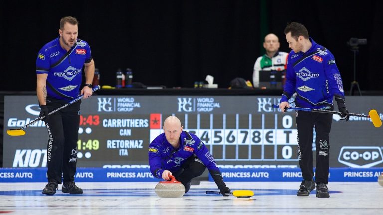 Brad Jacobs (centre) shoots a stone during the second draw of the WFG Masters on Tuesday, Dec. 12, 2023, at Merlis Belsher Place in Saskatoon. (Anil Mungal/GSOC)