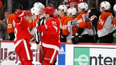 Kane scores twice in regulation, another in shootout as Red Wings fend off Flyers