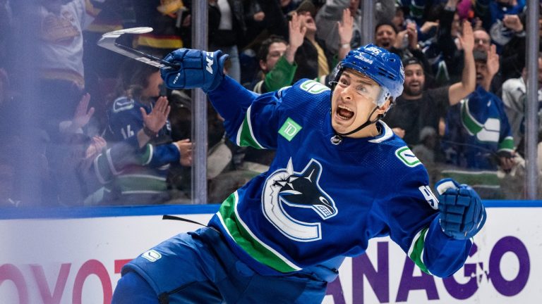 Vancouver Canucks' Andrei Kuzmenko (96) celebrates his goal against the Florida Panthers during the first period of an NHL game in Vancouver on Thursday, Dec. 14, 2023. (Ethan Cairns/THE CANADIAN PRESS)