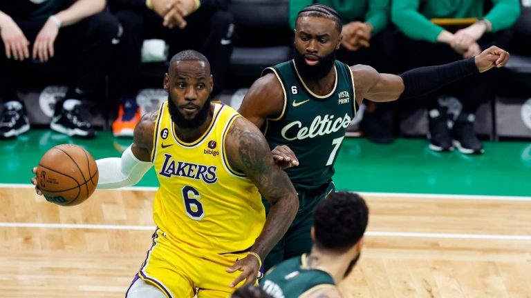 Los Angeles Lakers' LeBron James (6) drives for the basket in front of Boston Celtics' Jaylen Brown (7) during the first half of an NBA basketball game, Saturday, Jan. 28, 2023, in Boston. (Michael Dwyer/AP Photo)