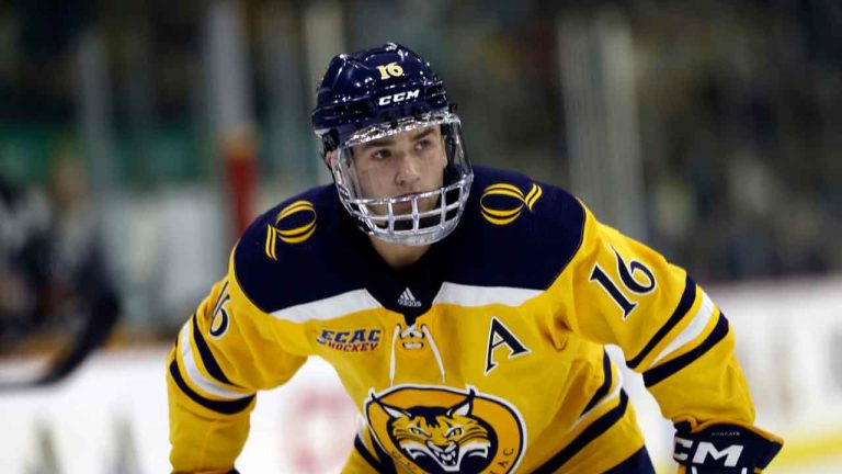 Quinnipiac forward Jacob Quillan (16) skates during the second period of an NCAA hockey game against Boston College. (Greg M. Cooper/AP)