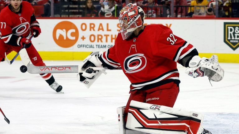 Carolina Hurricanes goaltender Antti Raanta bats the puck during the third period of the team's NHL hockey game against the Nashville Predators in Raleigh, N.C., Friday, Dec. 15, 2023. (Karl B DeBlaker/AP)