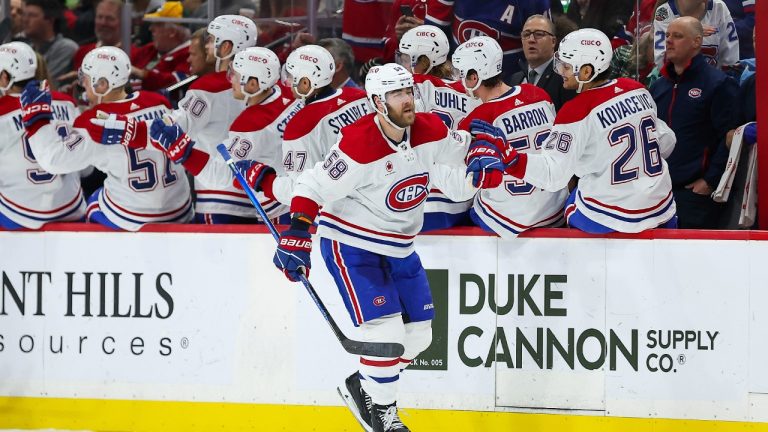 Montreal Canadiens defenceman David Savard (58) is congratulated after his goal against the Minnesota Wild during the second period of an NHL hockey game Thursday, Dec. 21, 2023, in St Paul, Minn. (Matt Krohn/AP)