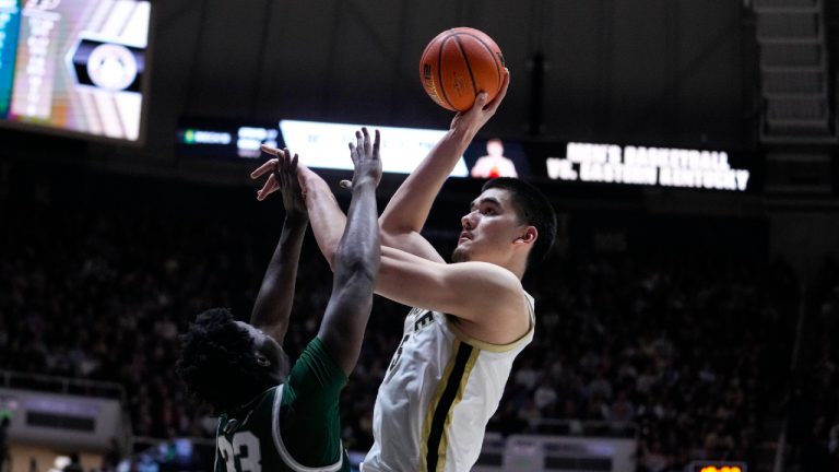 Purdue centre Zach Edey (15) shoots over Jacksonville forward Donovan Rivers (33) during the second half of an NCAA college basketball game in West Lafayette, Ind., Thursday, Dec. 21, 2023. (Michael Conroy/AP)