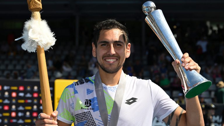 Alejandro Tabilo of Chile poses with his trophies after defeating Taro Daniel of Japan in the final of the ASB Classic tennis tournament in Auckland, New Zealand, Saturday, Jan. 13, 2024. (Andrew Cornaga/Photosport via AP)