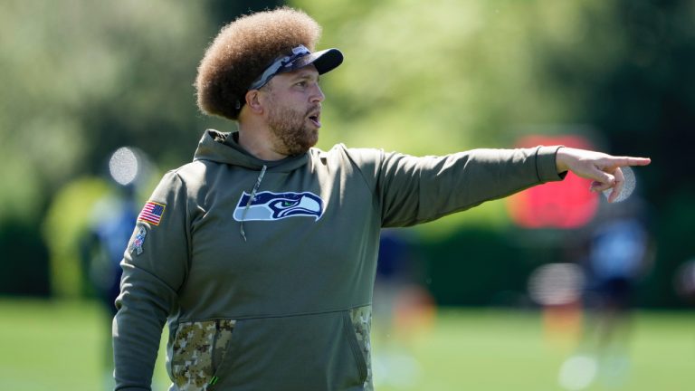 Seattle Seahawks offensive line coach Andy Dickerson points during the NFL football team's rookie minicamp, Friday, May 12, 2023, in Renton, Wash. (Lindsey Wasson/AP)