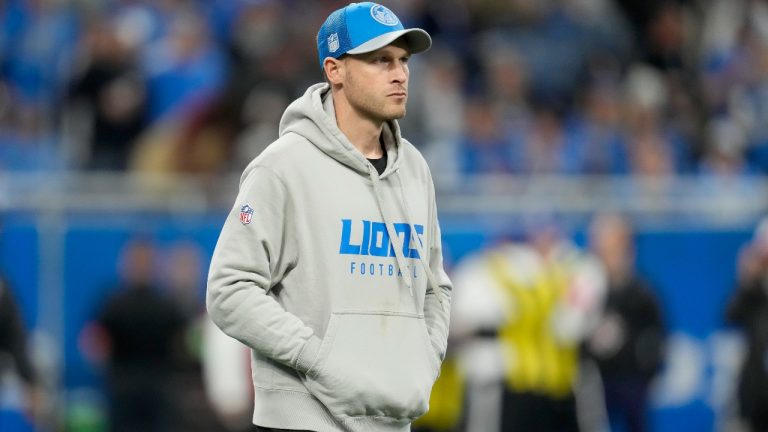 Detroit Lions offensive coordinator Ben Johnson looks on as his players work out prior to an NFL football NFC divisional playoff game against the Tampa Bay Buccaneers, Sunday, Jan. 21, 2024, in Detroit. (Paul Sancya/AP)