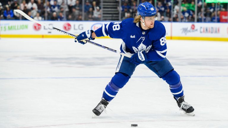 Toronto Maple Leafs right wing William Nylander (88) takes a shot against Detroit Red Wings goaltender Alex Nedeljkovic during second period NHL hockey action in Toronto on Sunday, April 2, 2023. (Christopher Katsarov/CP)