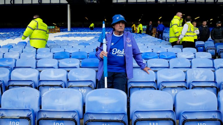 A Everton's fan stands dejected at the end of the English Premier League soccer match between Everton and Manchester City at the Goodison Park stadium in Liverpool, England, Sunday, May 14, 2023. (Jon Super/AP) 