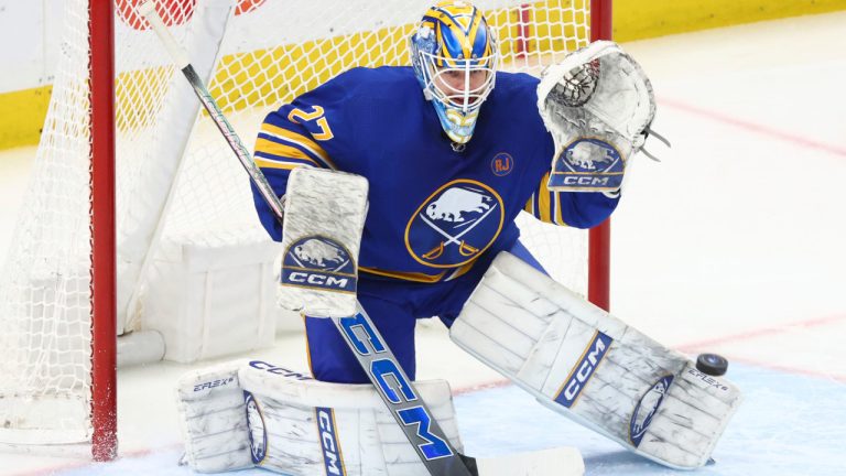 Buffalo Sabres goaltender Devon Levi (27) makes a save during the third period of an NHL hockey game against the Seattle Kraken Tuesday, Jan. 9, 2024, in Buffalo, N.Y. (Jeffrey T. Barnes/AP) 