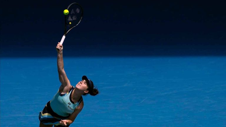 Linda Noskova of the Czech Republic serves to Elina Svitolina of Ukraine during their fourth round match at the Australian Open tennis championships at Melbourne Park, Melbourne, Australia, Monday, Jan. 22, 2024. (Alessandra Tarantino/AP)