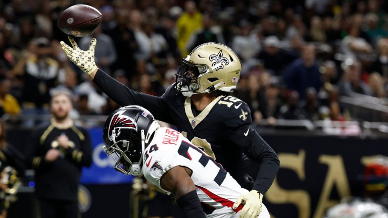 New Orleans Saints wide receiver Chris Olave (12) makes a touchdown catch against Atlanta Falcons cornerback Clark Phillips III (34) in the second half of an NFL football game in New Orleans, Sunday, Jan. 7, 2024. (Butch Dill/AP) 