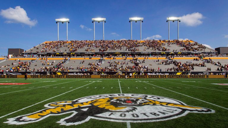 Hamilton Tiger-Cats fans leave the east grandstand following the annual CFL Labour Day Classic against the Toronto Argonauts and the inaugural game at the new Tim Hortons Field in Hamilton, Ont., Monday, September 1, 2014. (Aaron Lynett/CP)