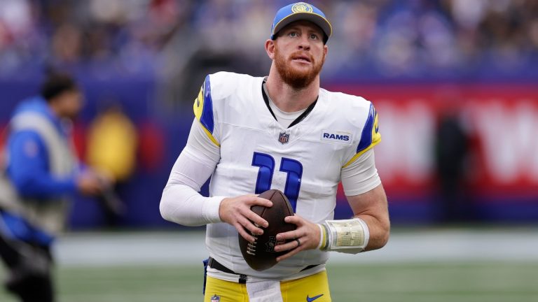 Los Angeles Rams quarterback Carson Wentz (11) takes the field before an NFL football game against the New York Giants, Sunday, Dec. 31, 2023, in East Rutherford, N.J. (AP Photo/Adam Hunger)