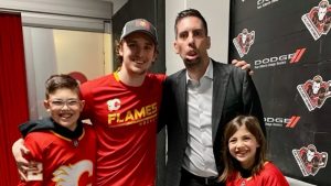 The Snow family, from left Cohen, Chris and Willa, with Jakob Pelletier after his NHL debut against the Tampa Bay Lightning on Jan. 21, 2023 (Photo courtesy: Kelsie Snow)