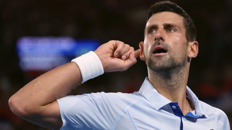 Novak Djokovic of Serbia reacts during his fourth round match against Adrian Mannarino of France at the Australian Open tennis championships at Melbourne Park, Melbourne, Australia, Sunday, Jan. 21, 2024. (Asanka Brendon Ratnayake/AP)