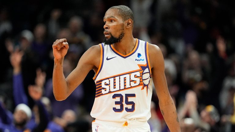 Phoenix Suns forward Kevin Durant (35) celebrates a basket against the Chicago Bulls during the second half of an NBA basketball game. (Matt York/AP)