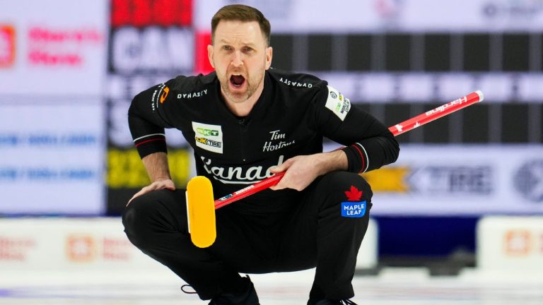 Canada skip Brad Gushue yells as they take on Scotland in the second end of the gold medal game at the Men's World Curling Championship in Ottawa on Sunday, April 9, 2023. (Sean Kilpatrick/CP Photo)