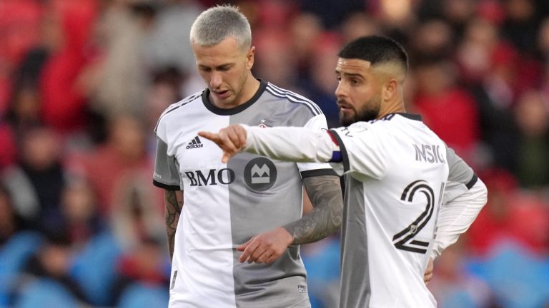 Toronto FC looks to put internal bickering behind it and end a tumultuous week on a winning note as D.C. United comes to town Saturday. Toronto FC's Lorenzo Insigne (right) and Federico Bernardeschi confer over a free kick during action MLS action against New York Red Bulls in Toronto on Wednesday May 17, 2023.THE CANADIAN PRESS/Chris Young