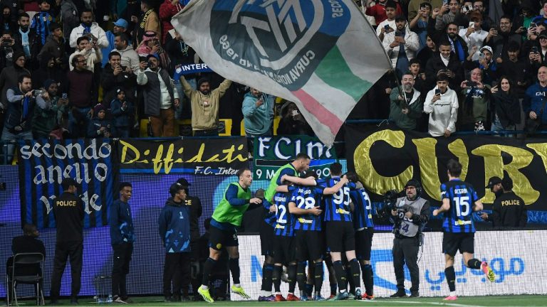 Inter Milan players celebrate during the Italian Super Cup semi-final soccer match between Lazio and Inter Milan at Al Awwal Park Stadium in Riyadh, Saudi Arabia, Friday, Jan. 19, 2024. (AP Photo)