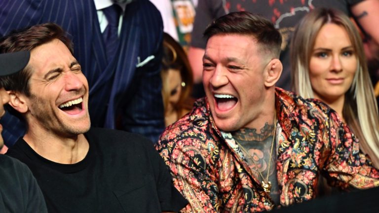 Jake Gyllenhaal, left, and Conor McGregor laugh during the UFC 285 mixed martial arts event Saturday, March 4, 2023, in Las Vegas. (AP Photo/David Becker)