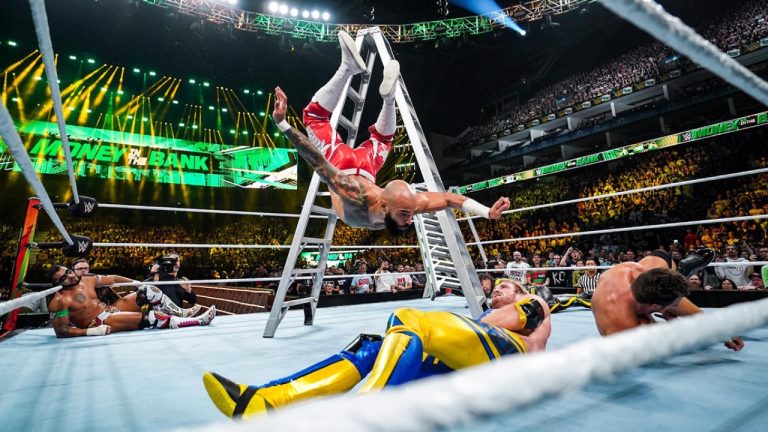 WWE Superstar Ricochet jumps off a ladder onto Logan Paul at WWE Money In the Bank 2023 (July 1, 2023/London, UK) 