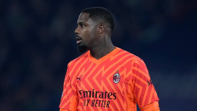 AC Milan goalkeeper Mike Maignan walked off the field after being subjected to racist chants by Udinese fans during a game on Saturday. (AP/Thibault Camus)