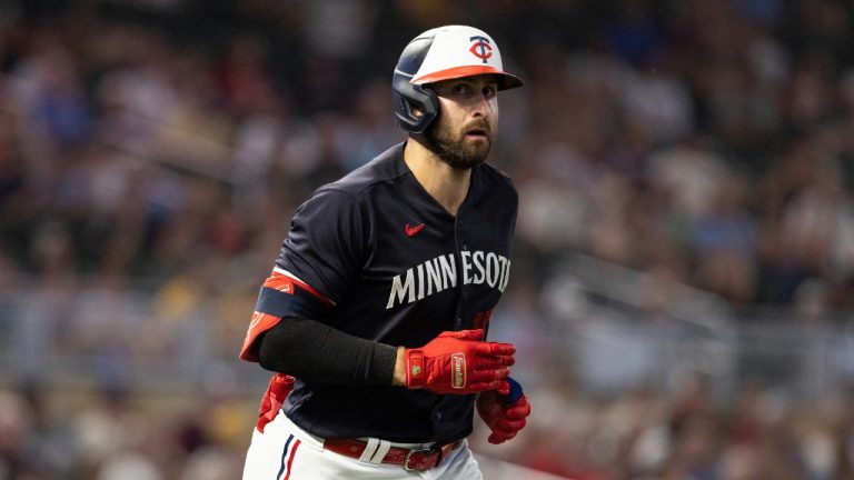 Minnesota Twins' Joey Gallo jogs to first base after being walked by Pittsburgh Pirates relief pitcher Thomas Hatch in the eighth of a baseball game Saturday, Aug. 19, 2023, in Minneapolis. (Bailey Hillesheim/AP)