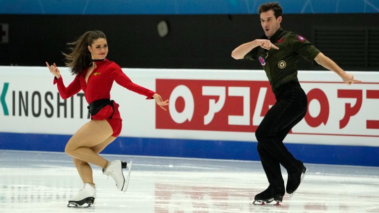 Canada's Laurence Fournier Beaudry and Nikolaj Sorensen practices ahead of the ISU Grand Prix of Figure Skating in Beijing, Wednesday, Dec. 6, 2023. (AP Photo/Ng Han Guan)