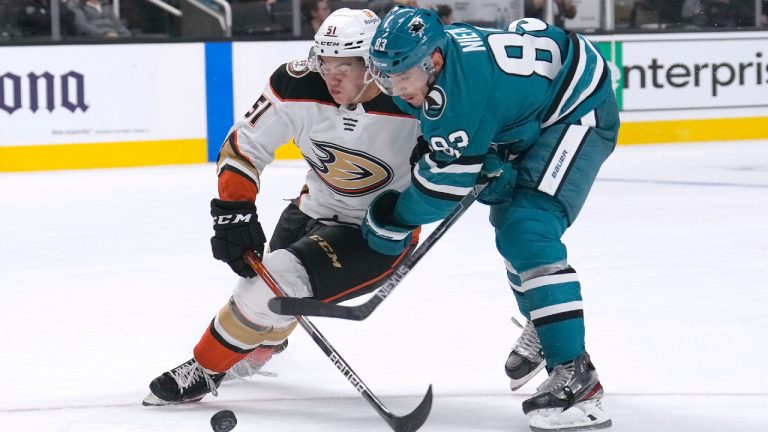 Anaheim Ducks defenceman Olen Zellweger (51) collides with San Jose Sharks left wing Matt Nieto (83) during the first period of a preseason NHL hockey game in San Jose, Calif., Tuesday, Sept. 27, 2022. (Tony Avelar/AP)