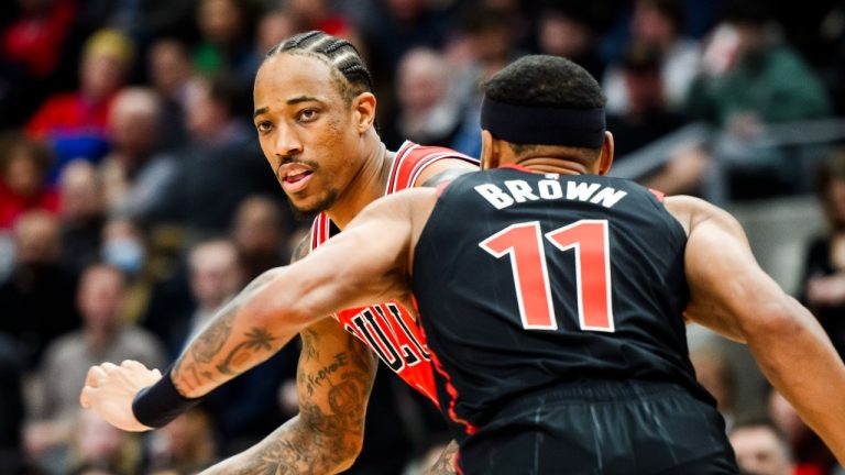 Chicago Bulls forward DeMar DeRozan (11) drives towards the net while guarded by Toronto Raptors forward Bruce Brown (11) during first half NBA basketball action in Toronto on Thursday, January 18, 2024. (Christopher Katsarov/CP)