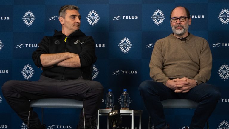 Vancouver Whitecaps FC Head Coach, Vanni Sartini, left, and CEO & Sporting Director, Axel Schuster, speak during an end-of-season news conference in Vancouver, on Tuesday, Nov. 7, 2023. (Ethan Cairns/CP)