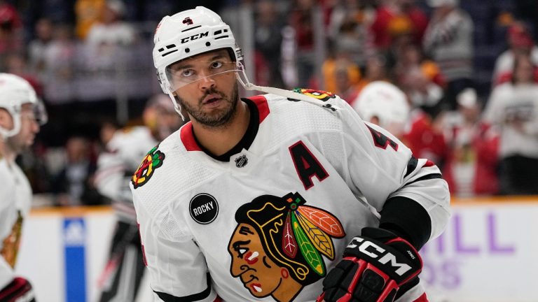 Chicago Blackhawks defenseman Seth Jones (4) warms up before an NHL hockey game against the Nashville Predators, Saturday, Nov. 18, 2023, in Nashville, Tenn. (AP Photo/George Walker IV)