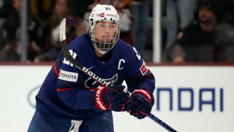 United States forward Hilary Knight skates to the bench to celebrate her goal against Canada during the first period of a rivalry series women's hockey game Wednesday, Nov. 8, 2023, in Tempe, Ariz. (Ross D. Franklin/AP)