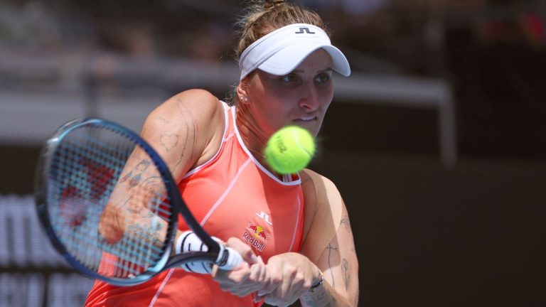 Marketa Vondrousova plays a backhand return to Dayana Yastremska during their first round match at the Australian Open tennis championships at Melbourne Park, Melbourne, Australia, Monday, Jan. 15, 2024. (Asanka Brendon Ratnayake/AP Photo)