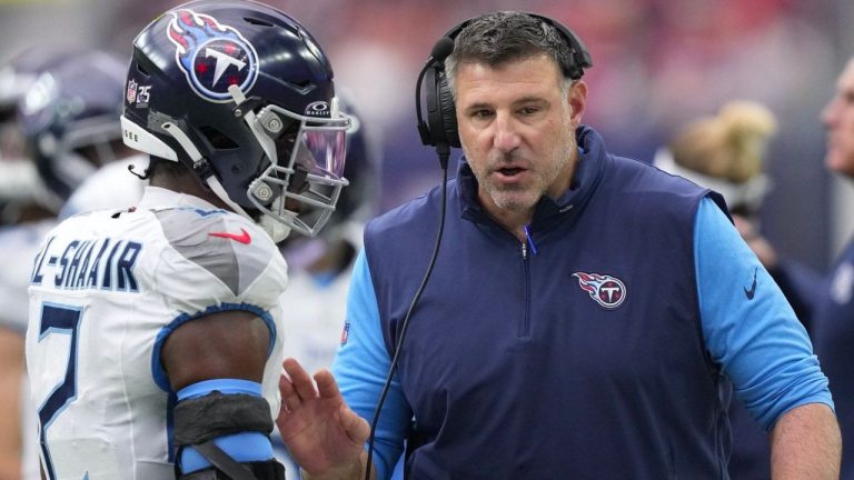 Tennessee Titans linebacker Azeez Al-Shaair talks with head coach Mike Vrabel during the second half of an NFL football game against the Houston Texans, Sunday, Dec. 31, 2023, in Houston. (David J. Phillip/AP Photo)