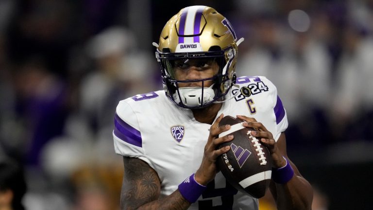 Washington quarterback Michael Penix Jr. warms up before the national championship NCAA College Football Playoff game between Washington and Michigan Monday, Jan. 8, 2024, in Houston. (Godofredo A. Vasquez/AP)