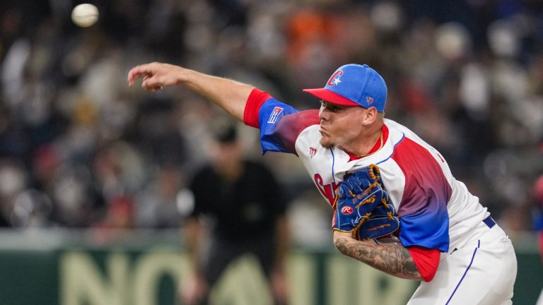 Yariel Rodriguez of Cuba pitches during the World Baseball Classic quarterfinal game between Cuba and Australia at the Tokyo Dome Tokyo, Wednesday, March 15, 2023. (Toru Hanai/AP)