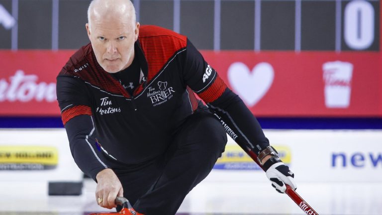 Glenn Howard makes a shot as he plays Team Wild Card Two at the Tim Hortons Brier in Lethbridge, Alta., Saturday, March 5, 2022. (Jeff McIntosh/CP)