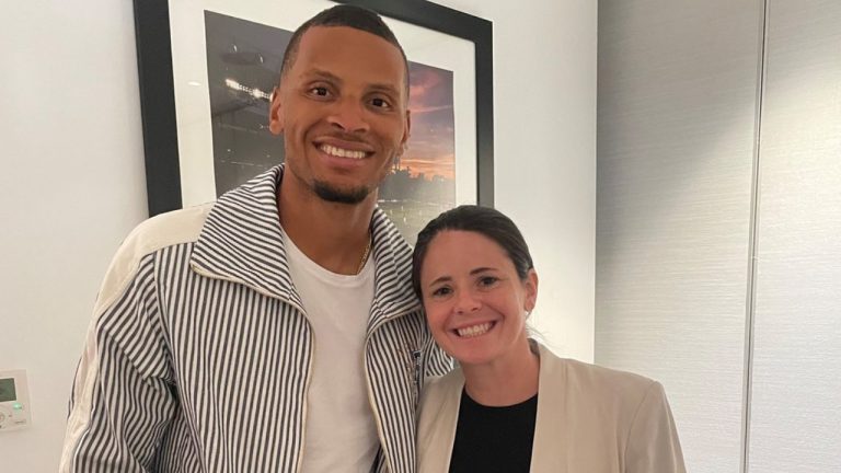 Sprinter Andre De Grasse and former Canadian international Diana Matheson are shown at the Canadian women’s soccer Olympic qualifier against Jamaica at BMO Field, in Toronto in a Sept. 26, 2023, handout photo. (CP/HO-Andre De Grasse)