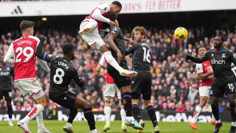 Arsenal's Gabriel, centre, scores his side's opening goal during the English Premier League soccer match between Arsenal and Crystal Palace at Emirates Stadium in London, Saturday, Jan. 20, 2024. (Kirsty Wigglesworth/AP)