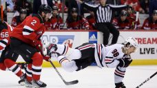 Blackhawks lose Bedard to injury, fall to Devils in heated game