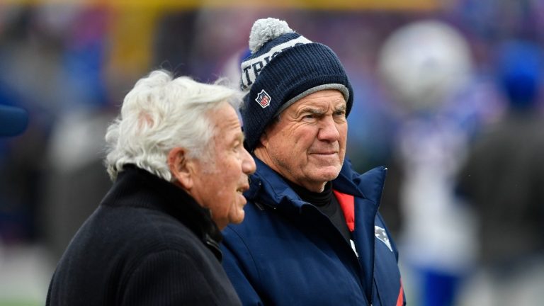 New England Patriots head coach Bill Belichick meets with Patriots owner Robert Kraft, left, before an NFL football game against the Buffalo Bills, Sunday, Jan. 8, 2023, in Orchard Park, N.Y. (Adrian Kraus/AP Photo)