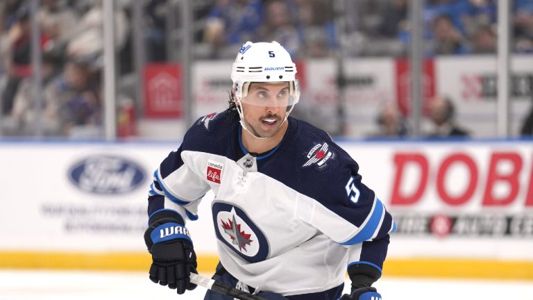 Winnipeg Jets' Brenden Dillon (5) in action during the second period of an NHL hockey game against the St. Louis Blues Tuesday, Nov. 7, 2023, in St. Louis. (Jeff Roberson/AP)