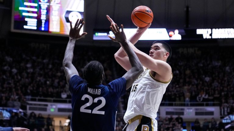 Purdue centre Zach Edey (15) shoots over Penn State forward Qudus Wahab (22) during the second half of an NCAA college basketball game in West Lafayette, Ind., Saturday, Jan. 13, 2024. (Michael Conroy/AP)