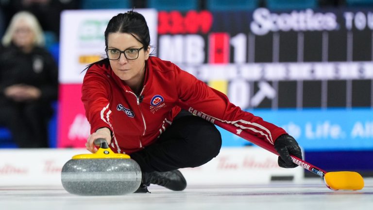 Kerri Einarson delivers a rock while playing Manitoba during the final at the Scotties Tournament of Hearts, in Kamloops, B.C., on Sunday, February 26, 2023. (Darryl Dyck/CP)