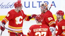 Flames cap off milestone night for Backlund with yet another comeback win