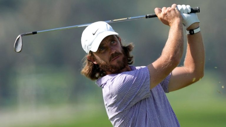 Tommy Fleetwood of England plays his second shot on the 1st hole during the final round of Dubai Invitational golf tournament, in Dubai, United Arab Emirates, Sunday, Jan. 14, 2024. (Kamran Jebreili/AP)